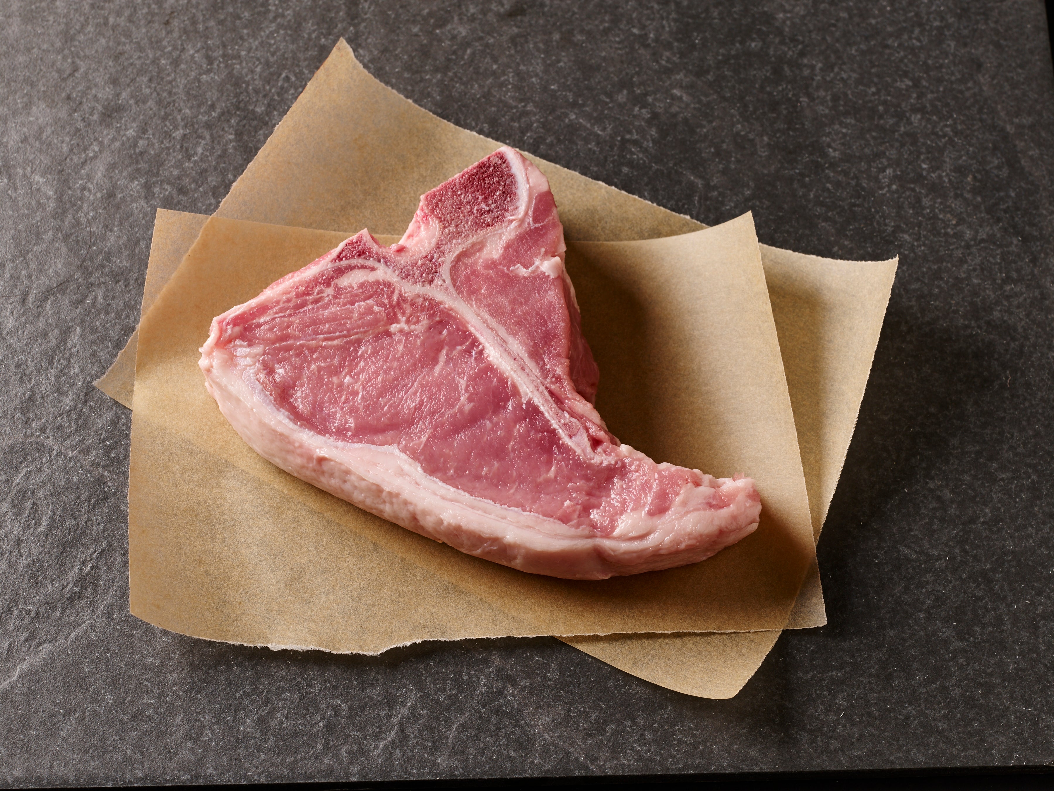Pan-Roasted Veal Chops with Applejack Sauce and Caramelized Onion and Apple Hash