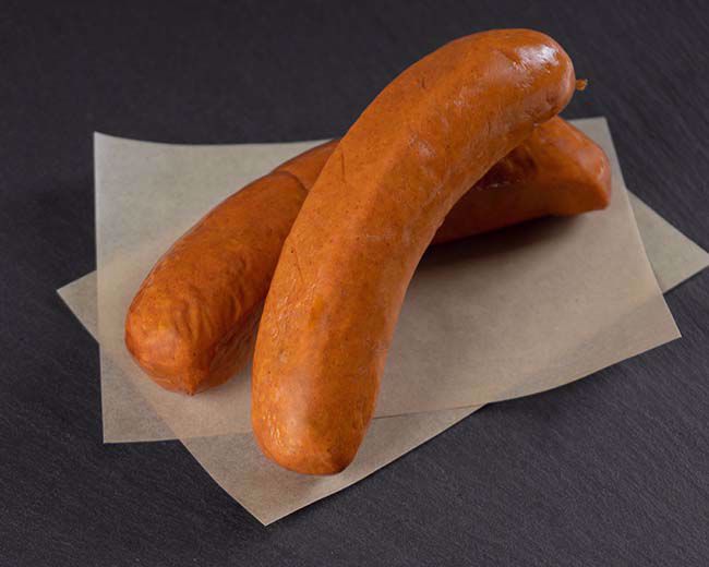 Brats with Glazed Red Onions