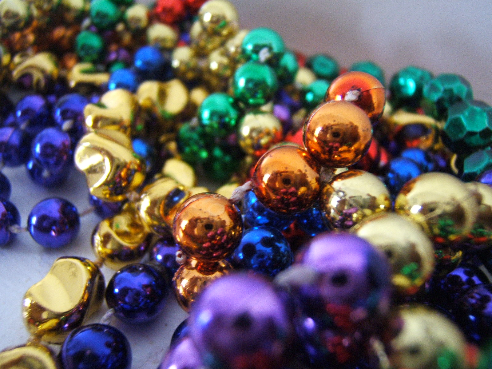 Mardi Gras beads - purple, green, gold, orange, blue